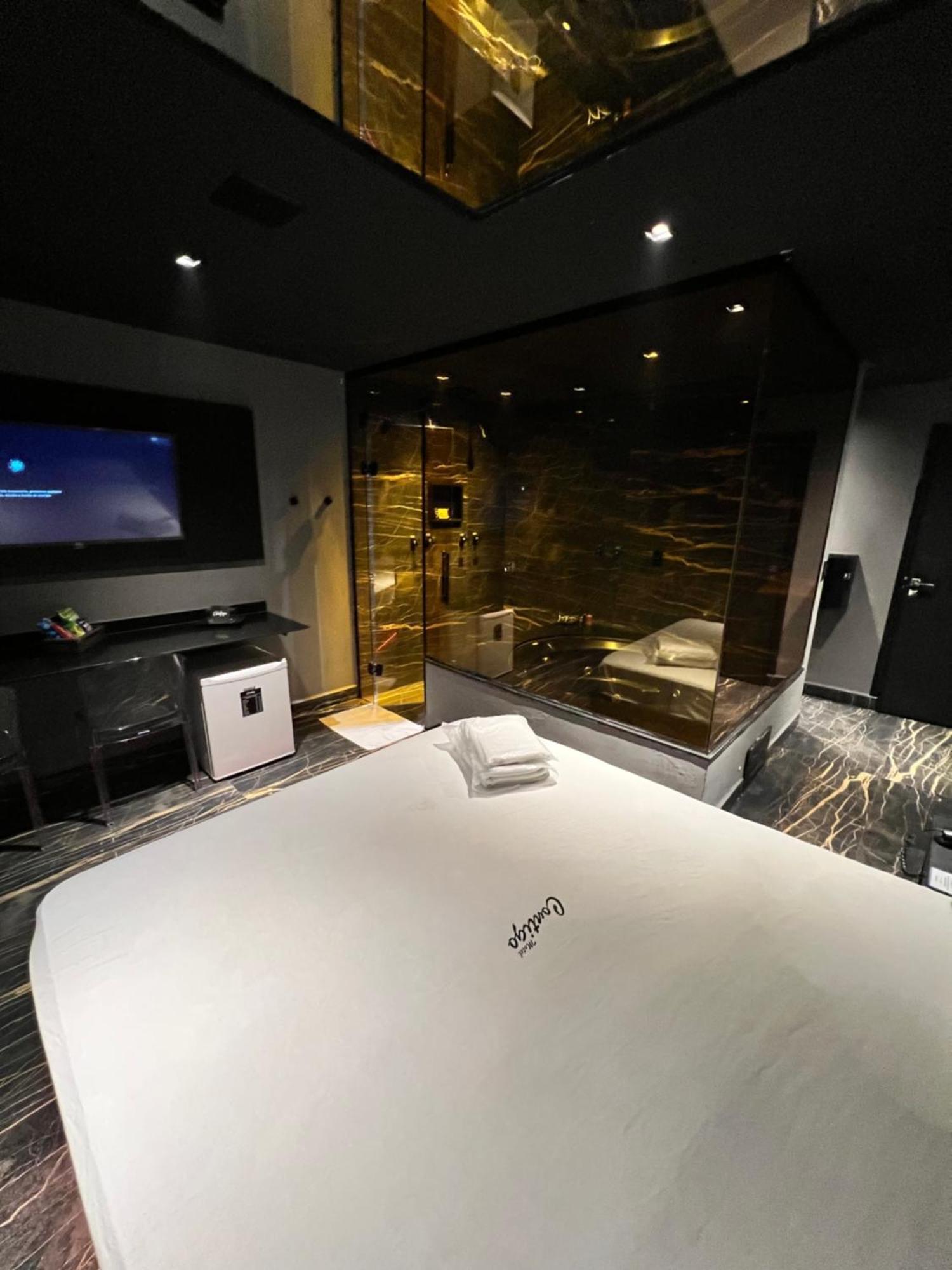 Motel Contigo กัวรูยุส ภายนอก รูปภาพ