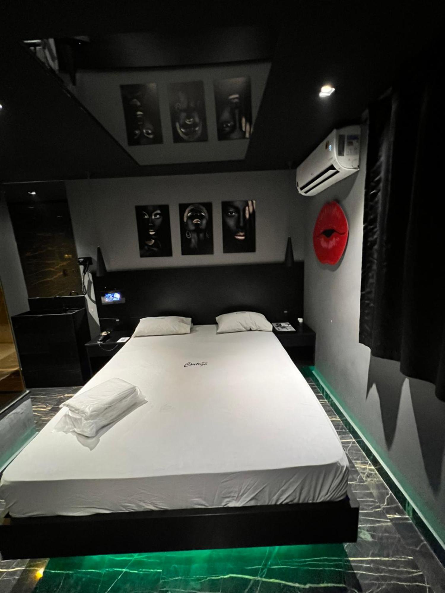 Motel Contigo กัวรูยุส ภายนอก รูปภาพ